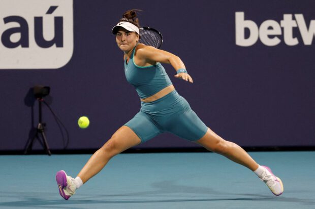 FILE PHOTO: Mar 27, 2023; Miami, Florida, US; Bianca Andreescu (CAN) reaches for a forehand against Ekaterina Alexandrova (not pictured) on day eight of the Miami Open at Hard Rock Stadium. Mandatory Credit: Geoff Burke-USA TODAY Sports
