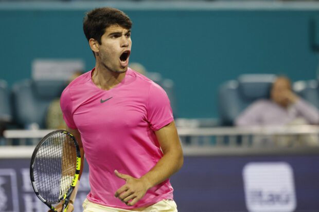 March 30, 2023;  Miami, Florida, USA;  Carlos Alcaraz (ESP) reacts after winning the first set against Taylor Fritz (USA) (not pictured) during the men's singles quarterfinals on day 11 of the Miami Open at Hard Rock Stadium.  Required credit: Geoff Burke-USA Sports TODAY
