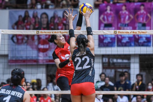 Aiza Pontillas (in red) goes for the kill en route to 13 points for Petro Gazz.  - PVL PHOTO