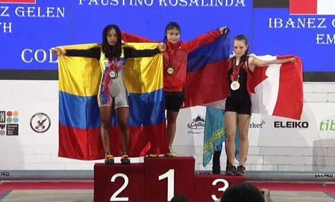Rosalinda Faustino lifts 100 kilograms (kg) to secure the clean and jerk gold in the girls’ 55-kg division before starring in the awarding where the Lupang Hinirang was played for the seventh time. —PHOTOS COURTESY OF INTERNATIONAL WEIGHTLIFTING FEDERATION