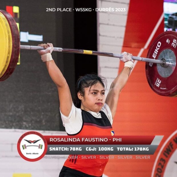 Rosalinda Faustino lifts 100 kilograms (kg) to secure the clean and jerk gold in the girls’ 55-kg division before starring in the awarding where the Lupang Hinirang was played for the seventh time. —PHOTOS COURTESY OF INTERNATIONAL WEIGHTLIFTING FEDERATION