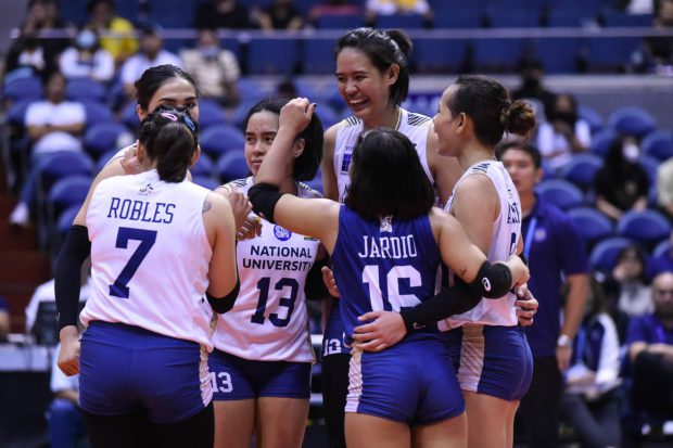 NU Lady Bulldogs celebrate in win over UP Fighting Maroons. –UAAP PHOTO