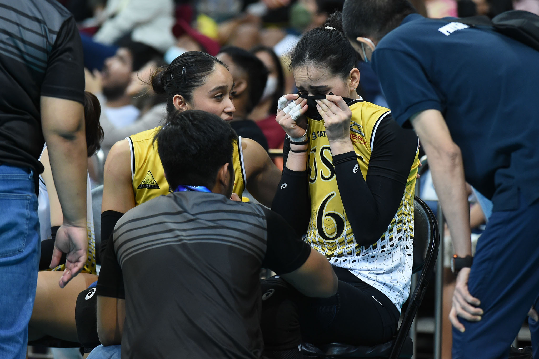Milena Alessandrini in tears after an injury scare  in the fourth set. –UAAP PHOTO