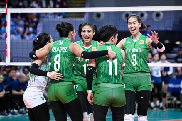 La Salle Lady Spikers celebrate a point against Nu Lady Bulldogs in the UAAP Season 85 women's volleyball tournament. -UAAP PHOTO