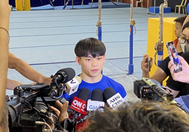 Carlos Yulo talks to the media after the unveiling of the new training center for grassroots gymnastics by the Japanese government. –ROMMEL FUERTES