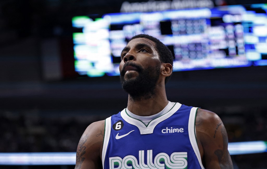  Kyrie Irving #2 of the Dallas Mavericks looks on during a break in the action against the Sacramento Kings in the second half at American Airlines Center on April 5, 2023 in Dallas, Texas. 