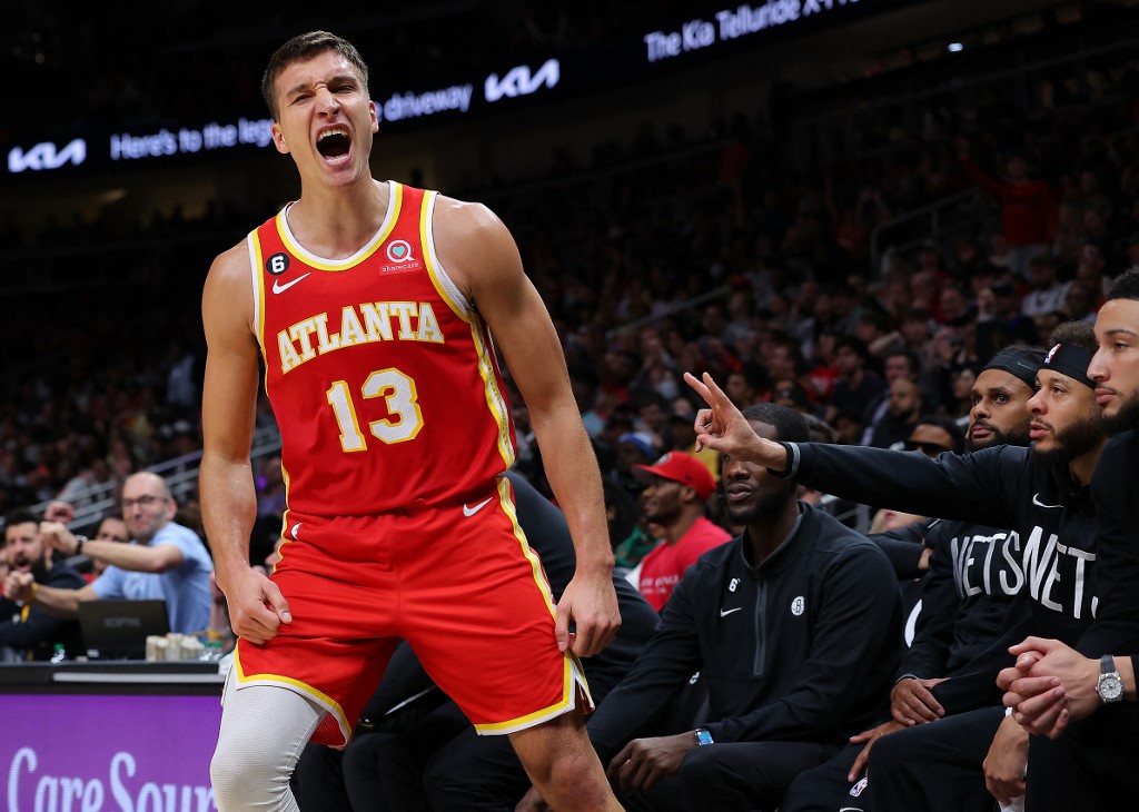 Bogdan Bogdanovic #13 of the Atlanta Hawks reacts after a basket against the Brooklyn Nets during the fourth quarter at State Farm Arena on February 26, 2023 in Atlanta, Georgia.