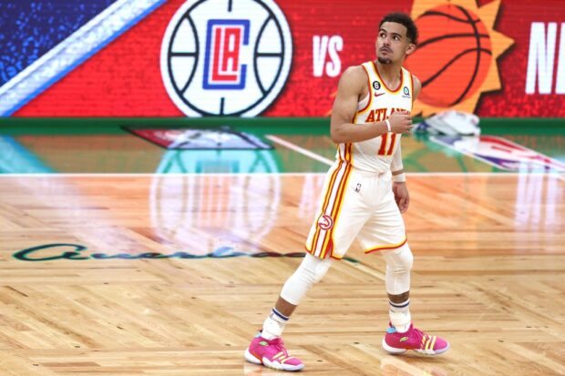 Trae Young #11 of the Atlanta Hawks watches his game winning 29-foot three point basket against Jaylen Brown #7 of the Boston Celtics during the fourth quarter in game five of the Eastern Conference First Round Playoffs at TD Garden on April 25, 2023 in Boston, Mass