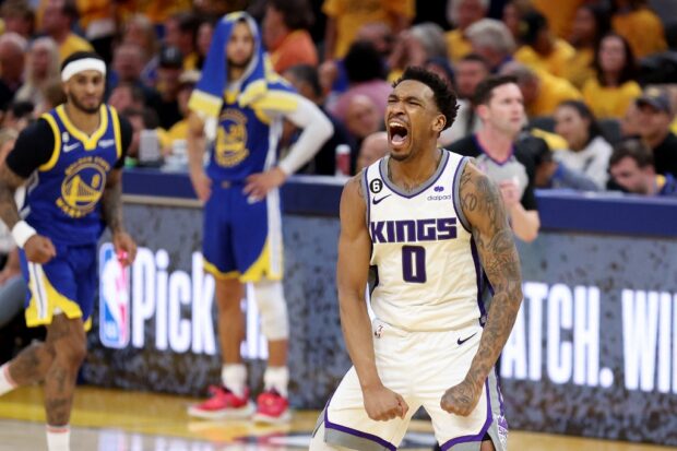  Malik Monk #0 of the Sacramento Kings reacts after making a basket in the second half Game Six of the Western Conference First Round Playoffs against the Golden State Warriors at Chase Center on April 28, 2023 in San Francisco, California. 