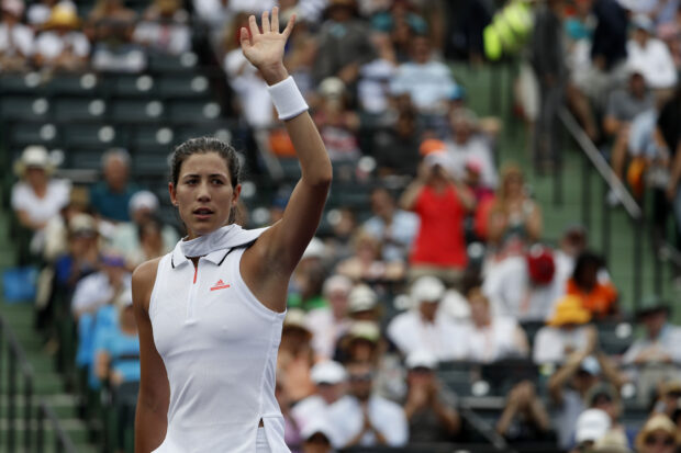 FILE PHOTO: Mar 24, 2017; Miami, FL, USA; Garbine Muguruza of Spain waves to the crowd after her match against Christina McHale of the United States (not pictured) on day four of the 2017 Miami Open at Brandon Park Tennis Center. Muguruza won 0-6, 7-6(6), 6-4. Mandatory Credit: Geoff Burke-USA TODAY Sports