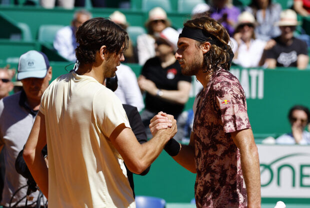 Tennis - ATP Masters 1000 - Monte Carlo Masters - Monte-Carlo Country Club, Roquebrune-Cap-Martin, France - April 14, 2023  Taylor Fritz of the U.S. and Greece's Stefanos Tsitsipas shake hands after their quarter final match REUTERS/Eric Gaillard