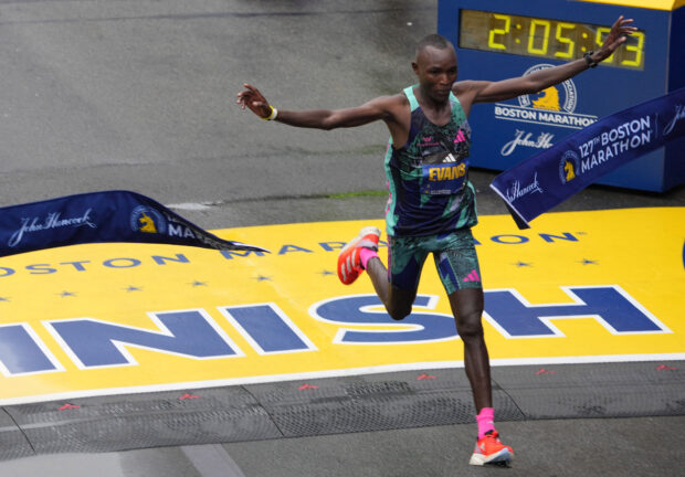 Athletics - The 127th Boston Marathon - Boston, Massachusetts, U.S. - April 17, 2023 Kenya's Evans Chebet crosses the finish line to win the elite men's race