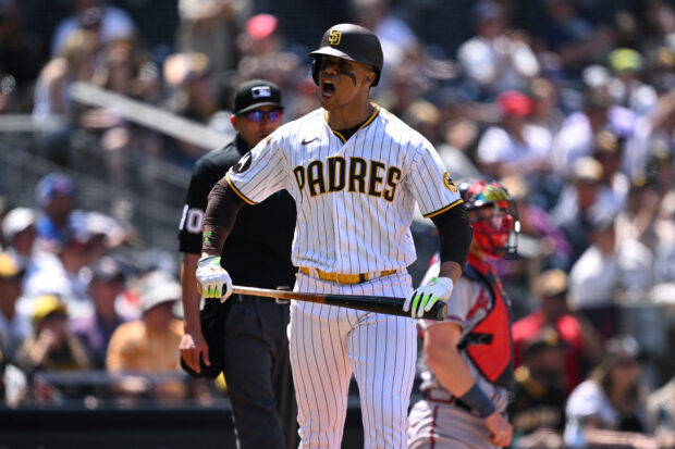 an Diego, California, USA; San Diego Padres left fielder Juan Soto (22) reacts after hitting a home run against the Atlanta Braves during the fourth inning at Petco Park.