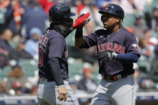 Apr 19, 2023; Detroit, Michigan, USA; Cleveland Guardians third baseman Jose Ramirez (11) celebrates with Guardians left fielder Steven Kwan (38) after hitting a three run home run in the sixth inning against the Detroit Tigers at Comerica Park