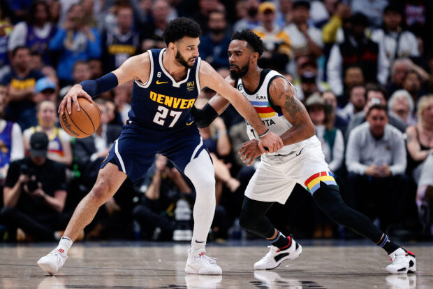 Apr 19, 2023; Denver, Colorado, USA; Denver Nuggets guard Jamal Murray (27) controls the ball as Minnesota Timberwolves guard Mike Conley (10) guards in the fourth quarter during game two of the 2023 NBA Playoffs at Ball Arena.