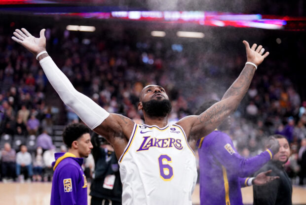 FILE PHOTO: Jan 7, 2023; Sacramento, California, USA; Los Angeles Lakers forward LeBron James (6) tosses chalk into the air before the start of the game against the Sacramento Kings at the Golden 1 Center.