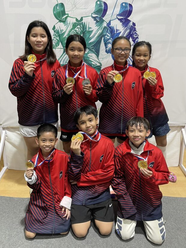 Opao Catantan, Shy Catantan, Willa Galvez, Yuri Canlas, Teo Canlas, Ayce Olarte and Inigo Divinagracia show their gold medals in the Admirals Fencing Invitational 2023 on Saturday at The Palms Country Club in Alabang, Muntinlupa City. –CONTRIBUTED PHOTO 
