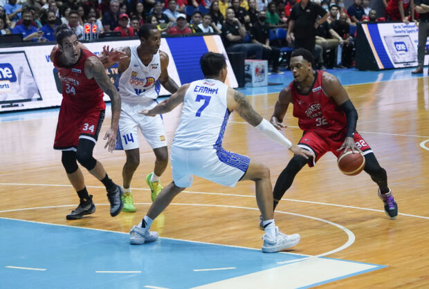 Tim Cone says Poy Erram (photo above, No. 7) plays a big role defensively against Ginebra’s Christian Standhardinger (left) and Justin Brownlee (right). —AUGUST DELA CRUZ