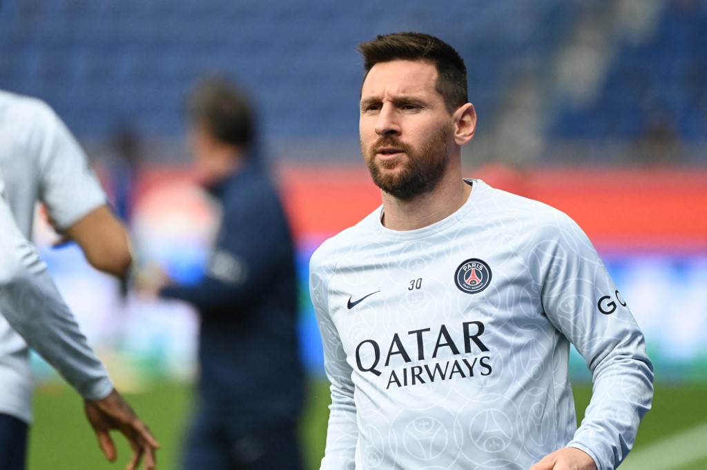 (FILES) In this file photo taken on April 30, 2023, Paris Saint-Germain's Argentine forward Lionel Messi looks on as he warms up prior to the French L1 football match between Paris Saint-Germain (PSG) and FC Lorient at The Parc des Princes Stadium in Paris
