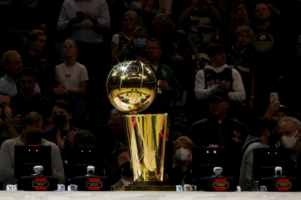 FILE– A general view of the NBA Larry O'Brien trophy during a ceremony before the game between the Brooklyn Nets and Milwaukee Bucks at the Fiserv Forum on October 19, 2021 in Milwaukee, Wisconsin. 