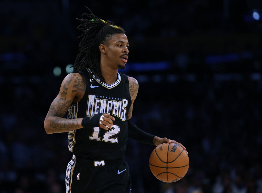 Ja Morant #12 of the Memphis Grizzlies brings the ball up court during a 111-101 Los Angeles Lakers win in Game Three of the Western Conference First Round Playoffs at Crypto.com Arena on April 22, 2023 in Los Angeles, California.