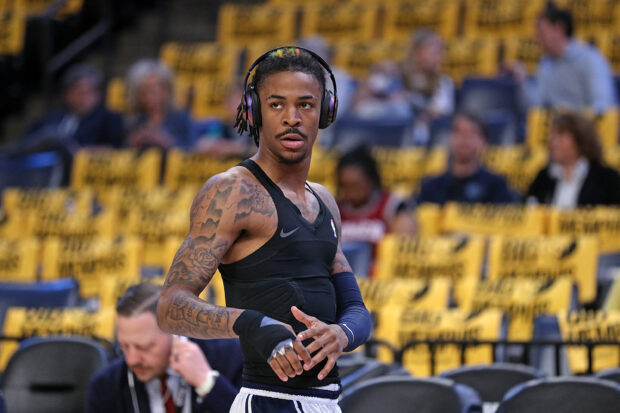 MEMPHIS, TENNESSEE - APRIL 26: Ja Morant #12 of the Memphis Grizzlies warms up before the game against the Los Angeles Lakers during Game Five of the Western Conference First Round Playoffs at FedExForum on April 26, 2023 in Memphis, Tennessee. 