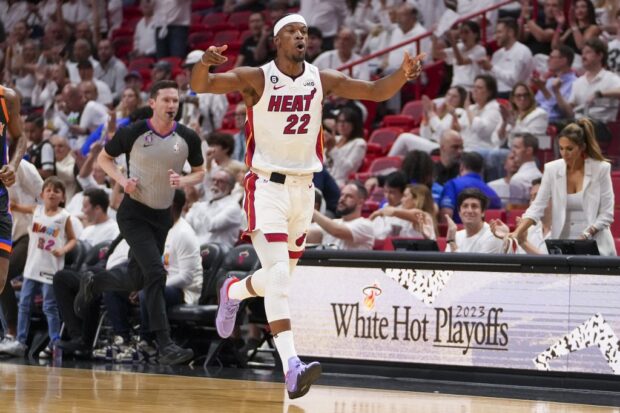 Jimmy Butler #22 of the Miami Heat celebrates hitting a three-point shot against the New York Knicks during game four of the Eastern Conference Semifinals at Kaseya Center on May 08, 2023 in Miami, Florida.