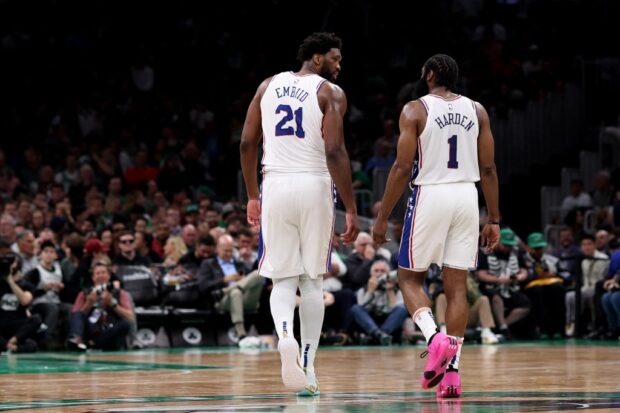 James Harden #1 of the Philadelphia 76ers and Joel Embiid #21 talk during the second half of game five of the Eastern Conference Second Round Playoffs against the Boston Celtics at TD Garden on May 09, 2023 in Boston, Massachusetts.