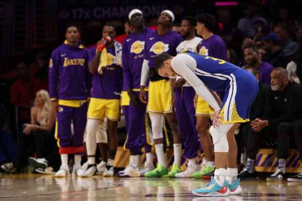 Stephen Curry #30 of the Golden State Warriors reacts during the fourth quarter against the Los Angeles Lakers in game six of the Western Conference Semifinal Playoffs at Crypto.com Arena on May 12, 2023 in Los Angeles, California