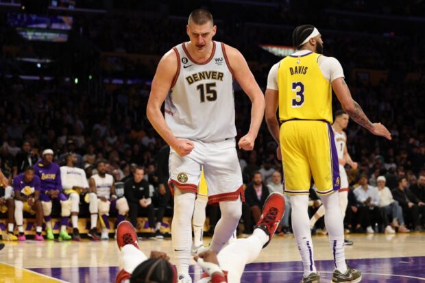 Nikola Jokic #15 of the Denver Nuggets reacts to a foul during the third quarter against the Los Angeles Lakers in game four of the Western Conference Finals at Crypto.com Arena on May 22, 2023 in Los Angeles, California.