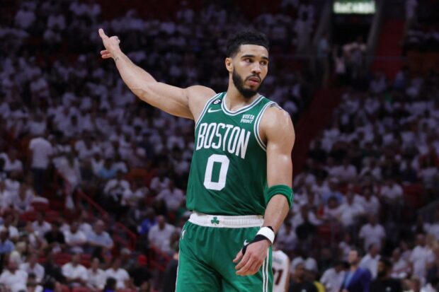 MIAMI, FLORIDA - MAY 23: Jayson Tatum #0 of the Boston Celtics reacts against the Miami Heat during the fourth quarter in game four of the Eastern Conference Finals at Kaseya Center on May 23, 2023 in Miami, Florida. 