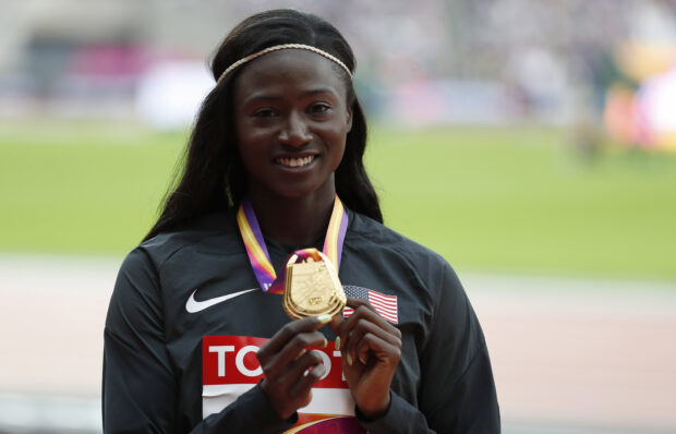 FILE PHOTO: Athletics - World Athletics Championships – women’s 100 metres victory ceremony – London Stadium, London, Britain – August 7, 2017 – Tori Bowie of the U.S. (Gold) poses with her medal. 