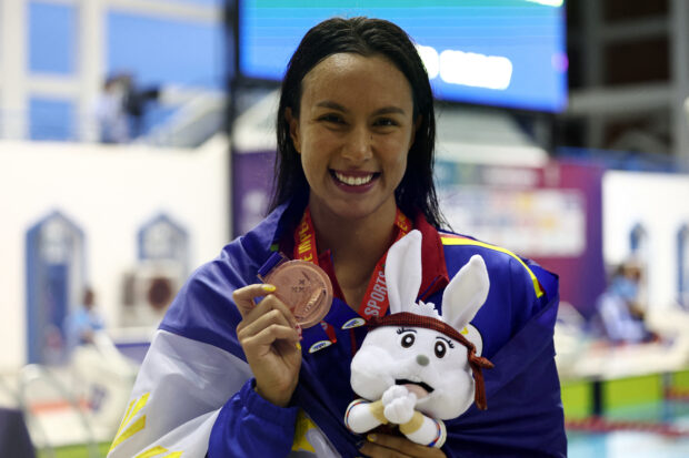Southeast Asian Games - Swimming - Morodok Techo National Aquatics Centre, Phnom Penh, Cambodia - May 9, 2023 Philippines' Jasmine Paler Alkhaldi poses with the bronze medal after finishing third in the women's 100m Butterfly 