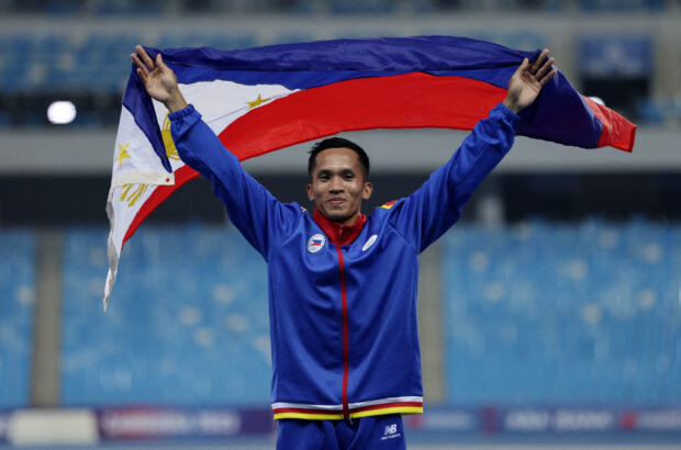 Southeast Asian Games - Athletics - Morodok Techo National Stadium, Phnom Penh, Cambodia - May 9, 2023 Philippines' Janry Ubas celebrates after winning gold in the men's long jump