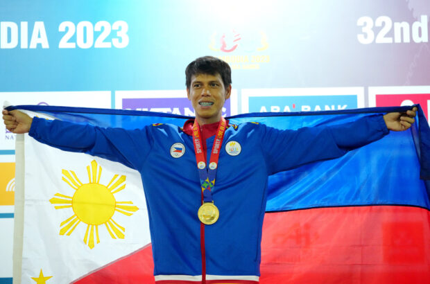 Southeast Asian Games - Soft Tennis - Olympic Tennis Complex, Phnom Penh, Cambodia - May 10, 2023 Philippines' Joseph Abas Arcilla celebrates after winning gold medal in the men's singles 