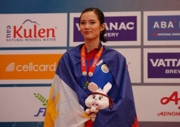 Agatha Wong celebrates winning gold in the women's Taijijian during the medal ceremony of the Southeast Asian Games in this May 12, 2023 photo.