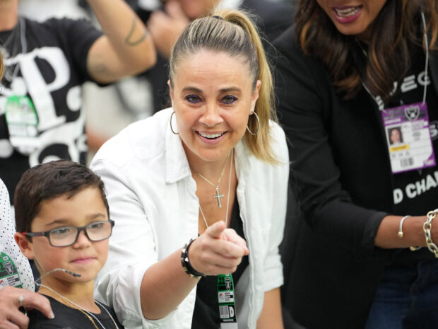 FILE PHOTO: Oct 2, 2022;  Paradise, Nevada, United States;  Las Vegas Aces head coach Becky Hammon walks the sidelines before the start of a game between the Las Vegas Raiders and the Denver Broncos at Allegiant Stadium. 