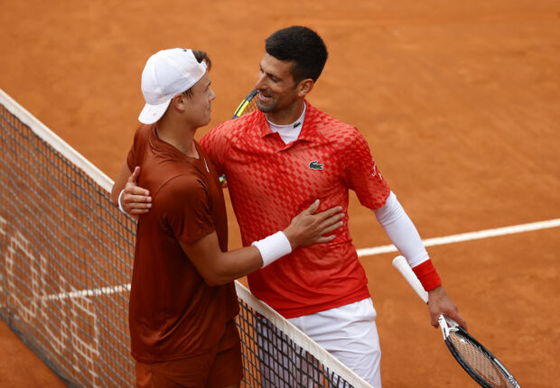 Tennis - Italian Open - Foro Italico, Rome, Italy - May 17, 2023 Denmark's Holger Rune with Serbia's Novak Djokovic after winning his quarter final match 