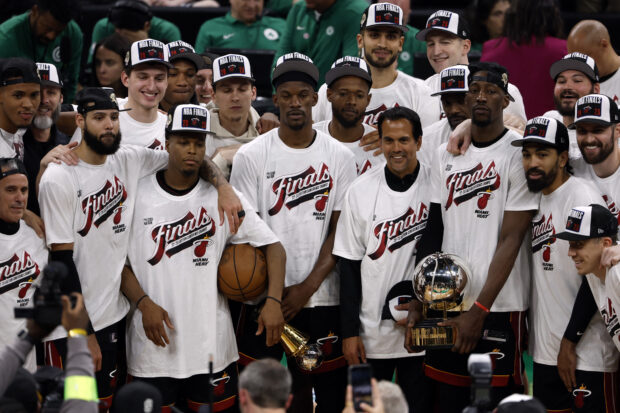 May 29, 2023; Boston, Massachusetts, USA; The Miami Heat celebrates on the podium after defeating the Boston Celtics in game seven of the Eastern Conference Finals for the 2023 NBA playoffs at TD Garden.