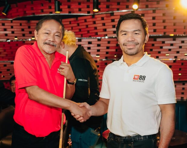 Efren Bata Reyes and Manny Pacquiao during an exhibition game.  – Mansion Sports Bar and Lounge