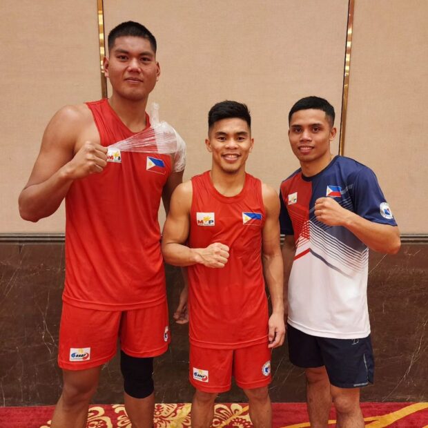 Filipino boxers Markus Cezar Tongco, Carlo Paalam and Paul Julyfer Bascon.