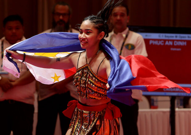Trixie Mary Lofranco wins a gold for the Philippines in arnis in the SEA Games 2023. –TEAM PHILIPPINES POOL