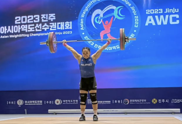 Hidilyn Diaz's successful lift in snatch in the 2023 Asian weightlifting championships in Jinju, Korea. 