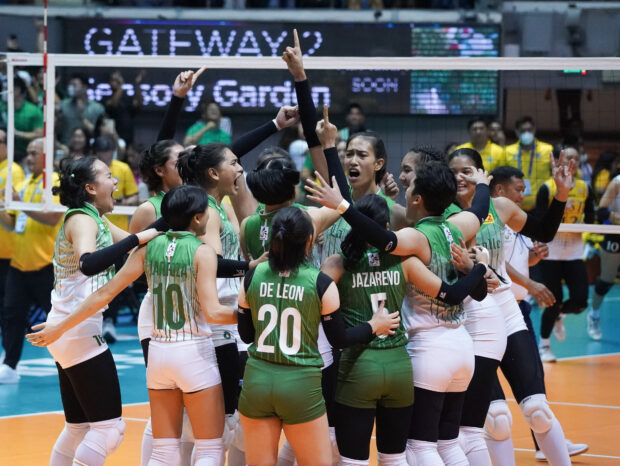The Lady Spikers celebrate at center court after ousting Eya Laure and the hard-fighting Tigresses in just one game of their FinalFour clash. They battle Bella Belen (photo below) and the Lady Bulldogs for the title starting Sunday. 