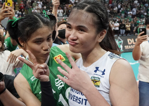 Angel Canino (left) and Bella Belen show class after the hard-fought contest.