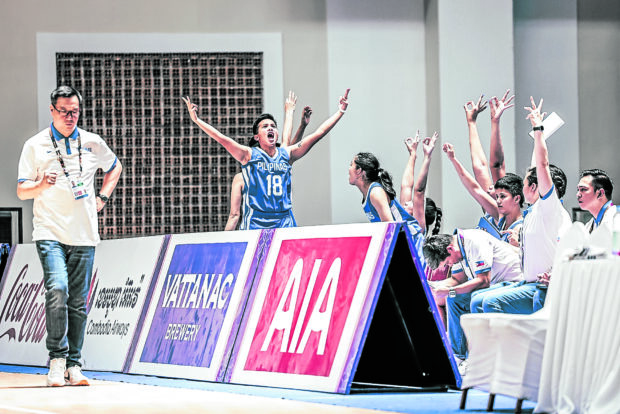 Coach Pat Aquino (left) and the Gilas Pilipinas women are staying positive after a silver finish in the SEA Games.  —CONTRIBUTED PHOTO/Ariya Kurniawan