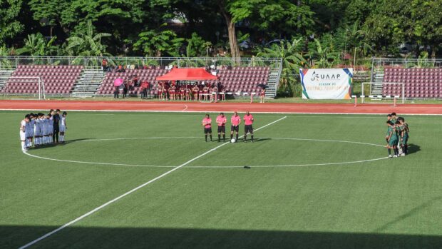 Moment of silence for Yoro Sangare before the UAAP Season 85 men's football game on Thursday. –UAAP PHOTO