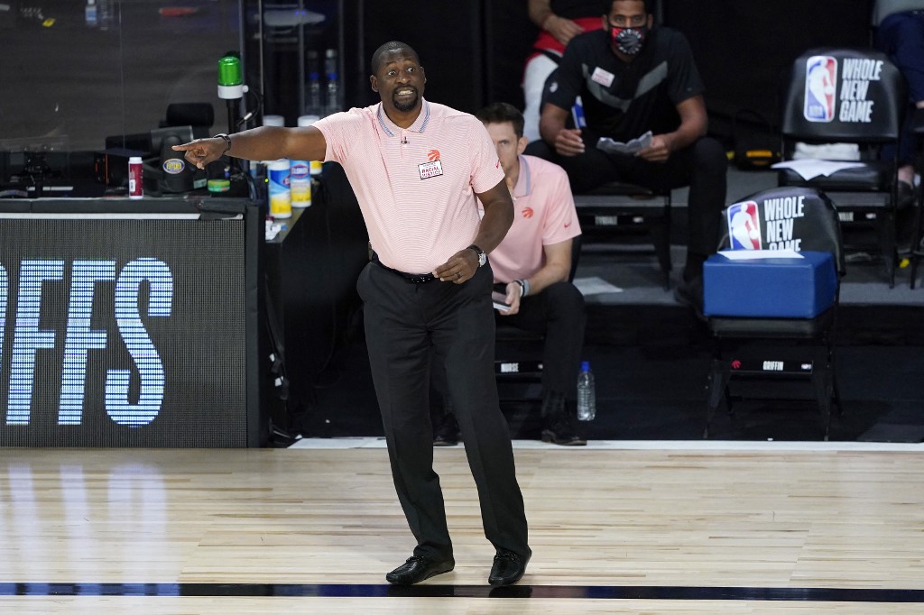 Assistant coach Adrian Griffin of the Toronto Raptors reacts during second-half action against the Philadelphia 76ers after head coach Nick Nurse stepped down for the night to let Griffin coach at The Field House at ESPN Wide World Of Sports Complex on August 12, 2020 in Lake Buena Vista, Florida. 