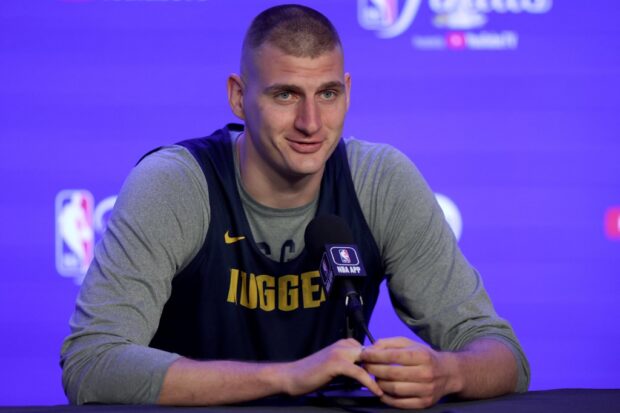 Nikola Jokic #15 of the Denver Nuggets fields questions during Media Day before Game One of the NBA Finals against the Miami Heat at Ball Arena on May 31, 2023 in Denver, Colorado.