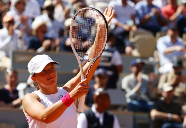 Tennis - French Open - Roland Garros, Paris, France - June 3, 2023 Poland's Iga Swiatek celebrates winning her third round match against China's Xinyu Wang 